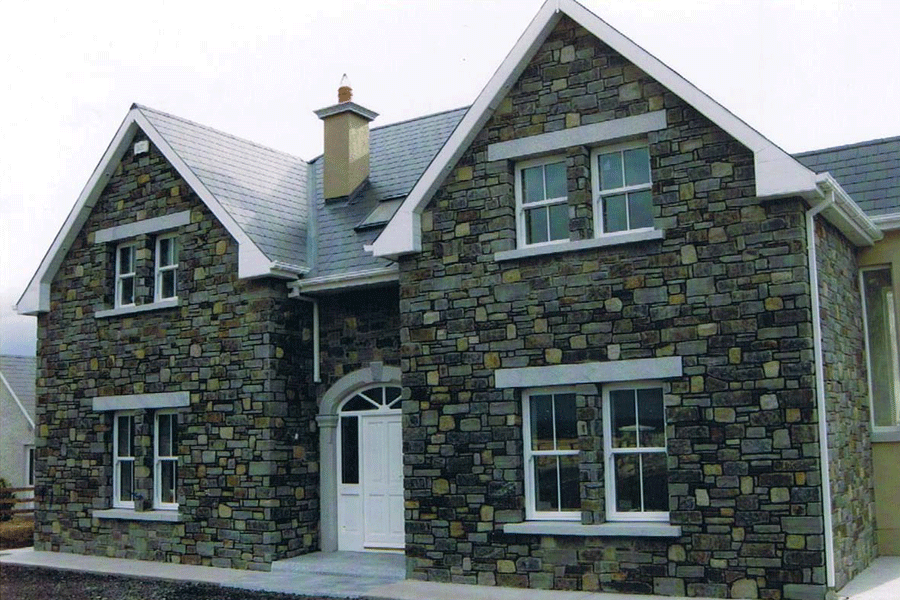 House with Cream and Grey Sandstone with Granite heads and sills