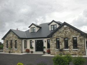 light cream and brown sandstone house in carlow